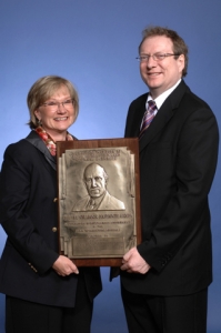 DeAnn Craig, president of the American Institute of Mining, Metallurgical, and Petroleum Engineers (AIME), presents Mike with the Hal Williams Hardinge Award, 2 March 2011, Denver.